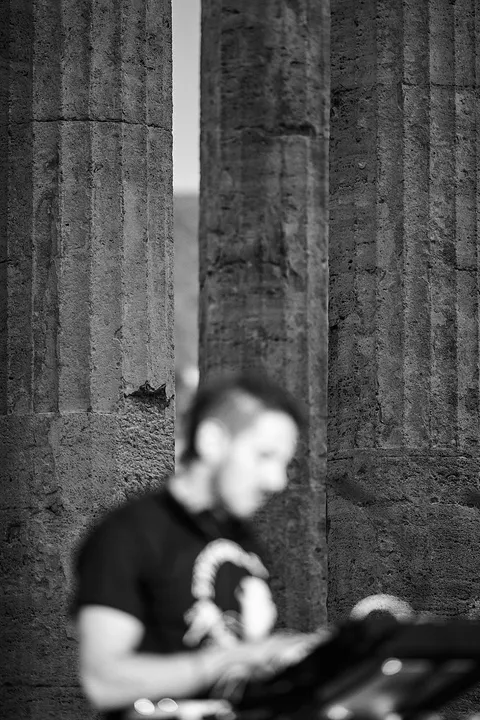 Yalu playing a eurorack synthesizer in the temple of hercules